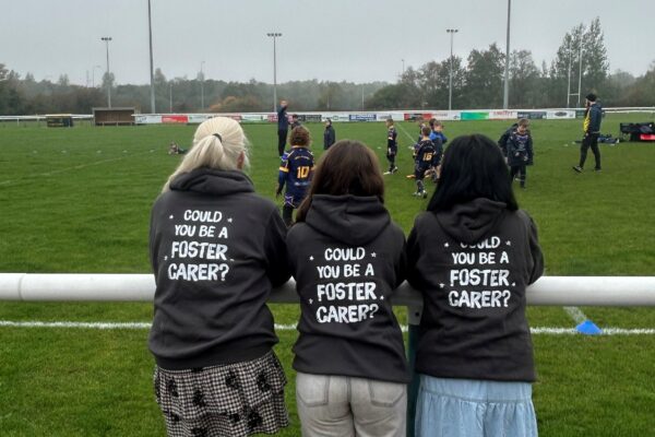 TACT staff watching Orrell St James ARLFC rugby team play a match