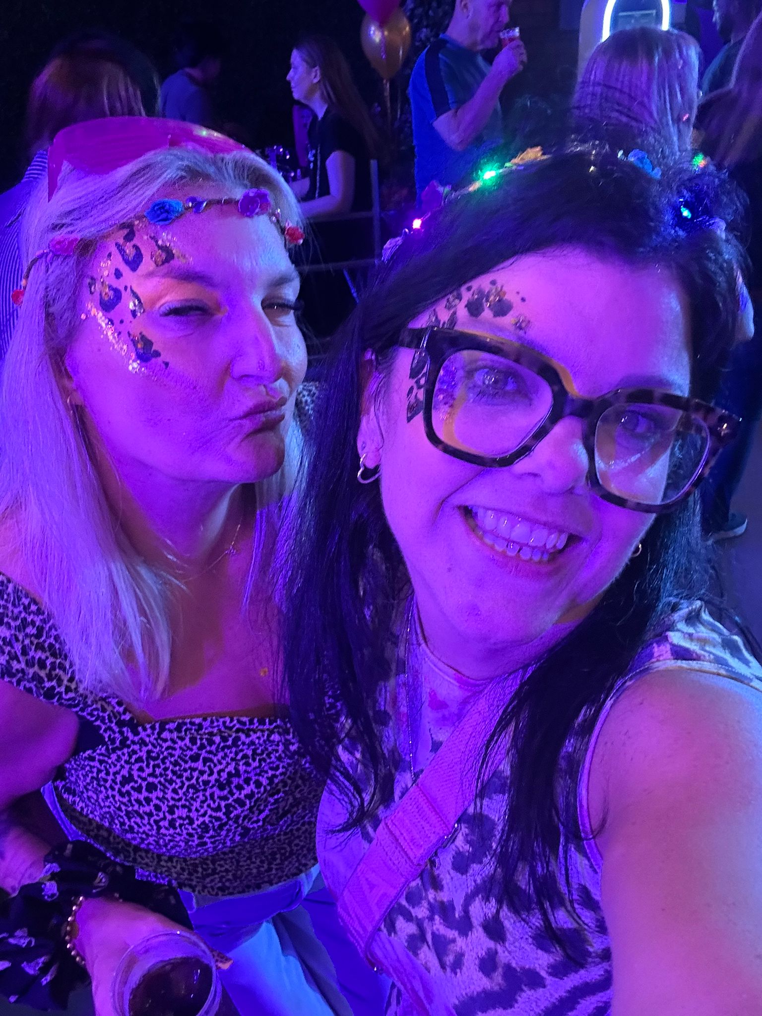 Two TACT staff having fun at a wellbeing event