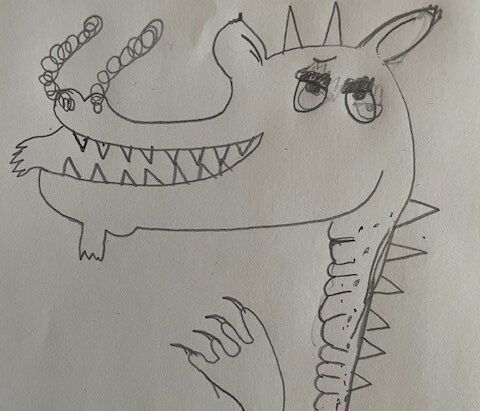 A young person's drawing of a dragon