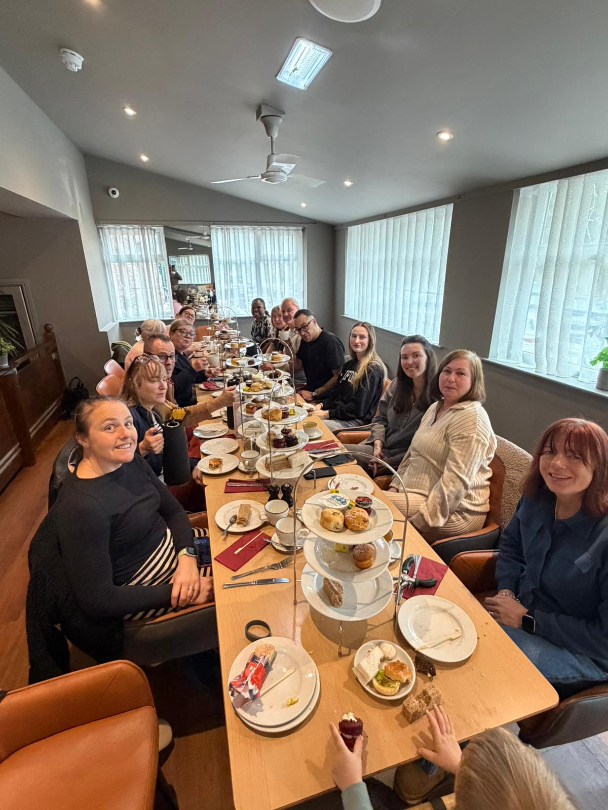 Our foster carers enjoying afternoon tea