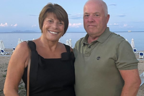 TACT foster carers Rhianydd and Gary smiling
