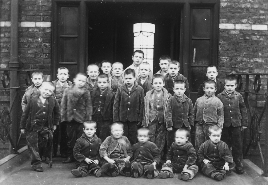 Children from a workhouse in Cheshire - similar to these children at Crumpsall workhouse.(c.1895) - were the first to be placed in foster care in the United Kingdom in 1853.