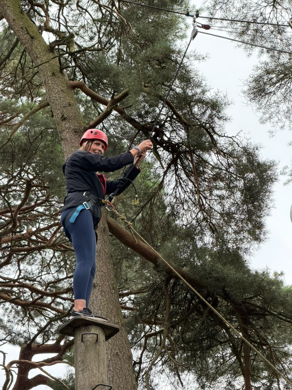 A foster carer smiling just before taking a leap of faith
